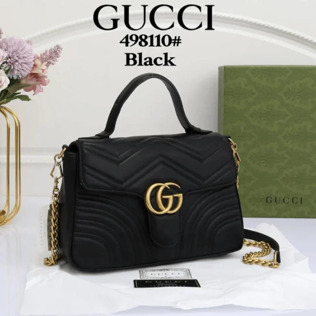 Gucci GG Marmont Black Handbag with Gold Logo – Elegant Luxury Designer Bag for Women.